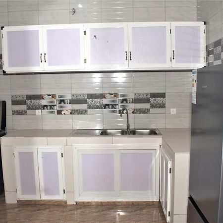 Residence Bellevue Sito Aiport- Ломе Екстериор снимка